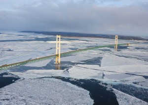 ice_forms_in_the_straits_of_mackinac_underneath_the_mackinac_bridge_near_st_120124-g-jl323-038