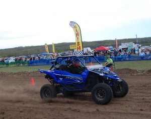 Dillon Sprague of Harrison give local fans something to cheer about as he crosses the finish line to win 1000 NA in his 2021 Yamaha  YXZ 1000R before an impressive crowd 
